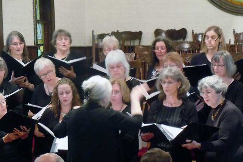 Betty Wagner directs the Frontenac Women's Chorus in their “Rock On, Frontenac” concert in Verona