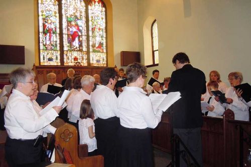 Brad Barbeau leads “The Crucifixion” performed by a community choir at St. Paul's Anglican Church in Sydenham on Good Friday